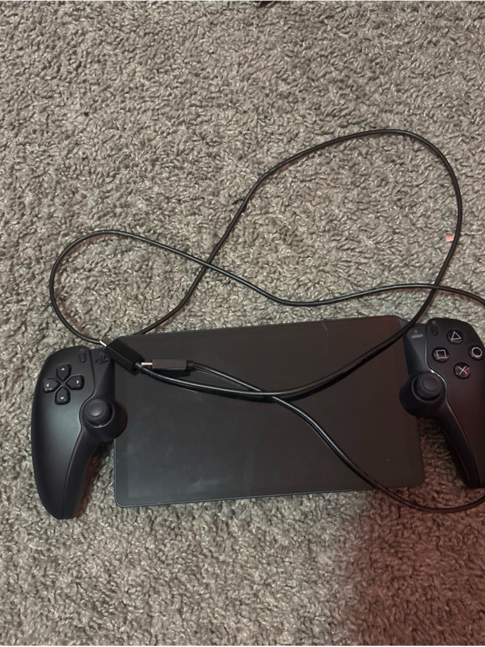 Sony Black Handheld Console with Dual Wireless-Style Controllers